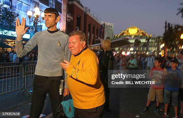 Two men play the parts of Spock and Captain Kirk from Star Trek during the unofficial after party of Comic-Con International 2016 on the street in...