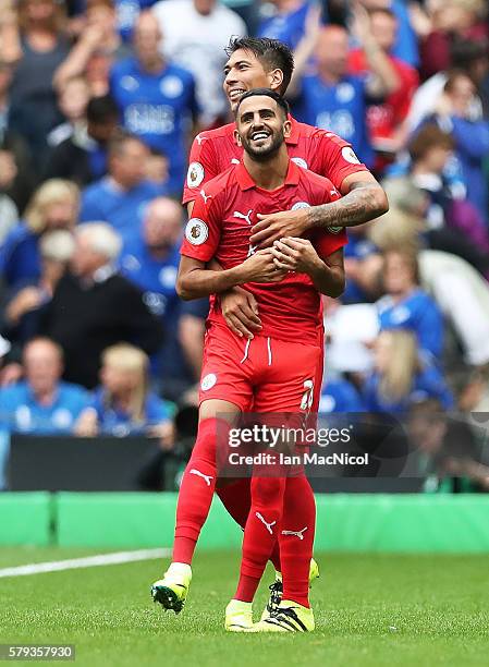 Riyad Mahrez of Leicester City is congratulated on his goal by Leonardo Ulloa of Leicester City during the Pre Seanon Friendly match between Cetlic...