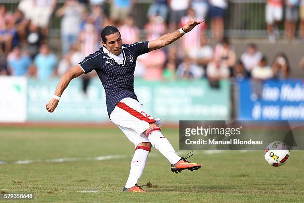 Enzo Crivelli of Bordeaux kicks the ball to score a goal from the penalty spot during the Pre season friendly match between Girondins de Bordeaux and...