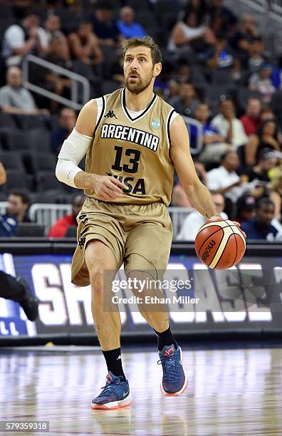 Andres Nocioni of Argentina brings the ball up the court against the United States during a USA Basketball showcase exhibition game at T-Mobile Arena...