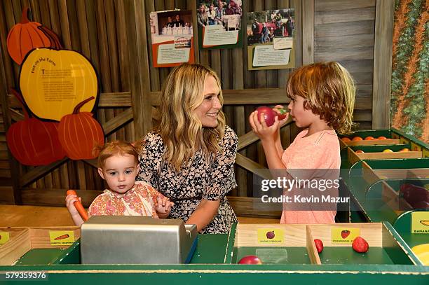 Scarlett May Stuber, Molly Sims and Brooks Alan Stuber attend The Children's Museum Of The East End 8th Annual Family Fair Fundraiser on July 23,...