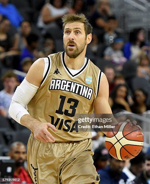 Andres Nocioni of Argentina brings the ball up the court against the United States during a USA Basketball showcase exhibition game at T-Mobile Arena...