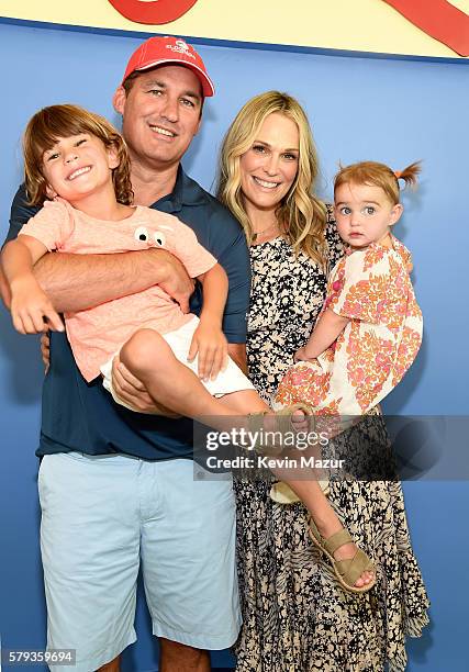 Scott Stuber, Brooks Alan Stuber, Scarlett May Stuber and Molly Sims attend The Children's Museum Of The East End 8th Annual Family Fair Fundraiser...