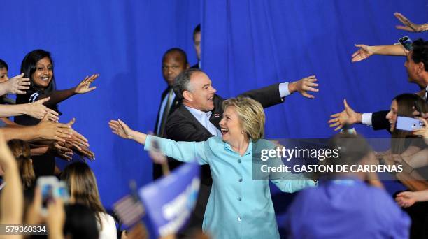 Democratic Presidential candidate Hillary Clinton and running mate US Senator Tim Kaine arrive for a campaign rally at Florida International...