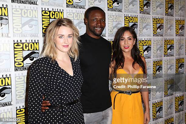 Actors Ashley Johnson, Rob Brown, and Audrey Esparza attend the 'Blindspot' press line during Comic-Con International 2016 on July 23, 2016 in San...