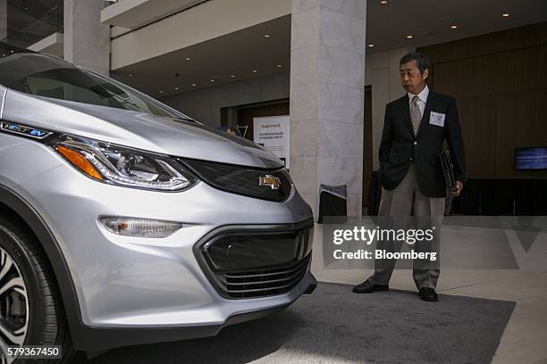 An attendee views the new General Motors Co. Chevrolet Volt EV electric compact vehicle during the Billington Global Automotive Cybersecurity Summit...