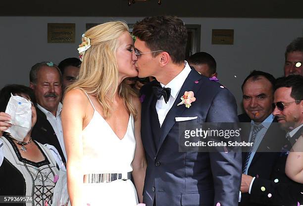 Bridegroom Mario Gomez and his wife Carina Wanzung during the wedding of Mario Gomez and Carina Wanzung on July 22, 2016 in Munich, Germany.