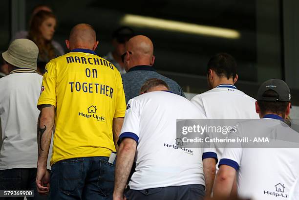 Leeds United fan wearing a shirt saying Marching on Together during the Pre-Season Friendly match between Peterborough United and Leeds United at...