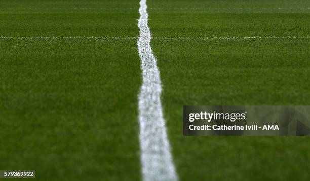 The wobbly painted centre white line on the pitch before the Pre-Season Friendly match between Peterborough United and Leeds United at London Road...