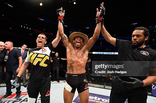 Alex Oliveira of Brazil celebrates after defeating James Moontasri by unanimous decision in their welterweight bout during the UFC Fight Night event...