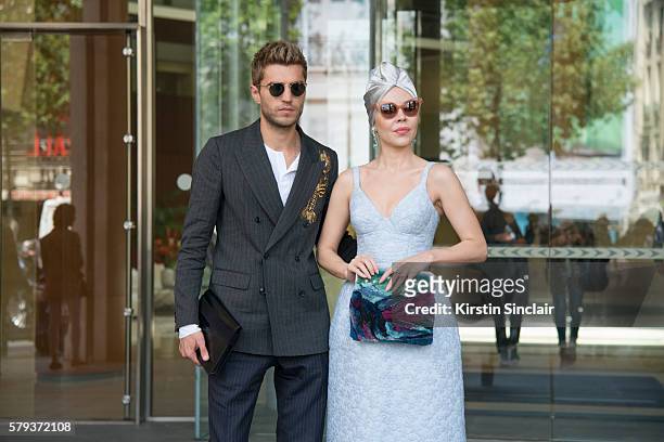 Marketing director Frol Burimskiy with Fashion designer Ulyana Sergeenko wearing an Ulyana Sergeenko dress and bag day 4 of Paris Haute Couture...