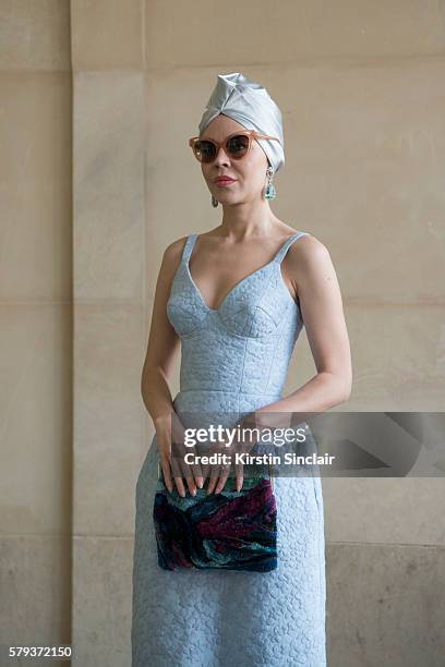 Fashion designer Ulyana Sergeenko wears an Ulyana Sergeenko dress and bag day 4 of Paris Haute Couture Fashion Week Autumn/Winter 2016, on July 6,...