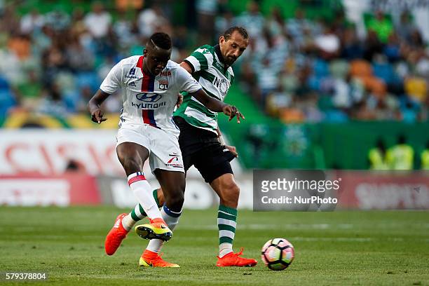 Lyon's midfielder Mouctar Diakhaby vies for the ball with Sporting's forward Hernan Barcos during the Pre Season friendly match football match...