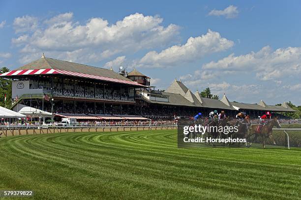 Horses round the clubhouse turn on the turf on July 23, 2016 at Saratoga Race Course, Saratoga Springs, NY