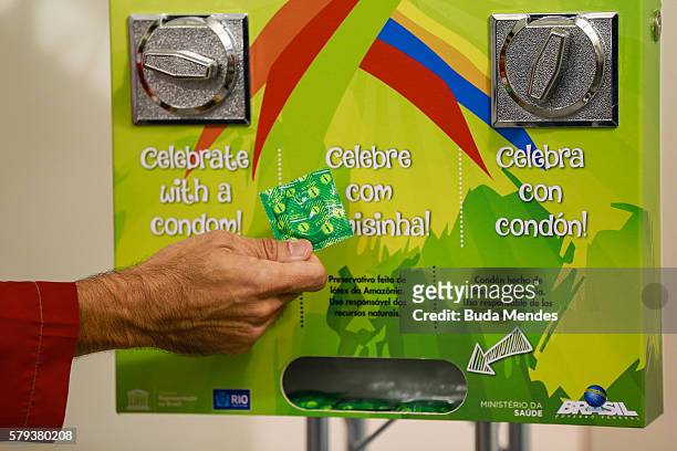 Condoms' distribution machine at the Olympic and Paralympic Village for the 2016 Rio Olympic Games displaying the Olympic Rings in Barra da Tijuca....