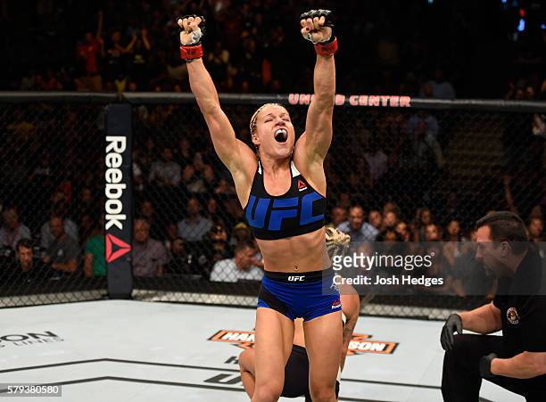 Felice Herrig celebrates after defeating Kailin Curran by submission in their women's strawweight bout during the UFC Fight Night event at the United...