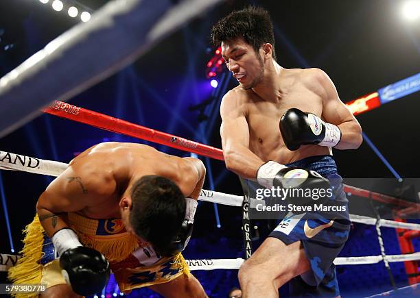 Boxer Ryota Murata of Japan punches George Tahdooahnippah during their middleweight fight at MGM Grand Garden Arena on July 23, 2016 in Las Vegas,...