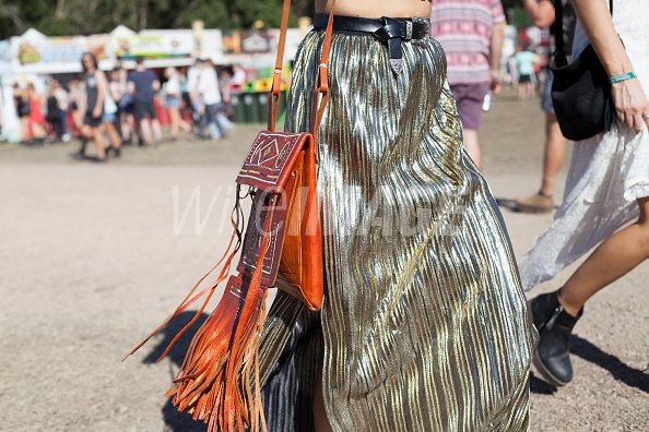 Festival Goer wears a gold...