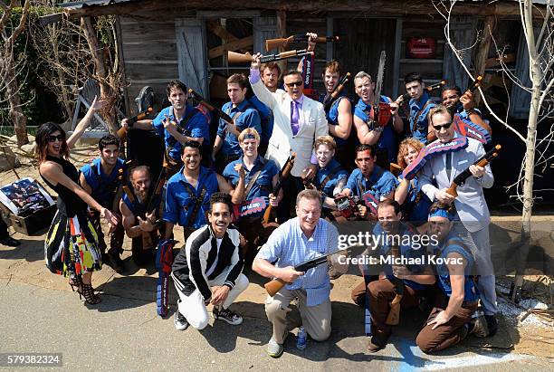 Actors Dana DeLorenzo, Ray Santiago, Bruce Campbell, Robert Tapert and Ted Raimi pose with guests at the "Ash vs Evil Dead" autograph signing during...