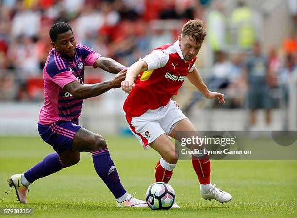 Lamine Kone of Sunderland and Lee Frecklington of Rotherham United during the Pre-Season Friendly match between Rotherham United and Sunderland at...