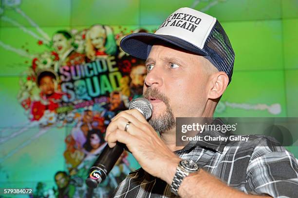 Director David Ayer from the cast of Suicide Squad film participates in an autograph session for fans in DC's 2016 Comic-Con booth at San Diego...