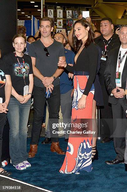 Actors Chris Pine and Gal Gadot from the 2017 feature film Wonder Woman attend an autograph signing session for fans in DC's 2016 San Diego Comic-Con...