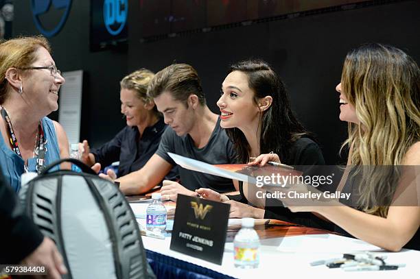 Actors Connie Nielsen, Chris Pine, Gal Gadot and director Patty Jenkins from the 2017 feature film Wonder Woman sign autographs for fans in DC's 2016...