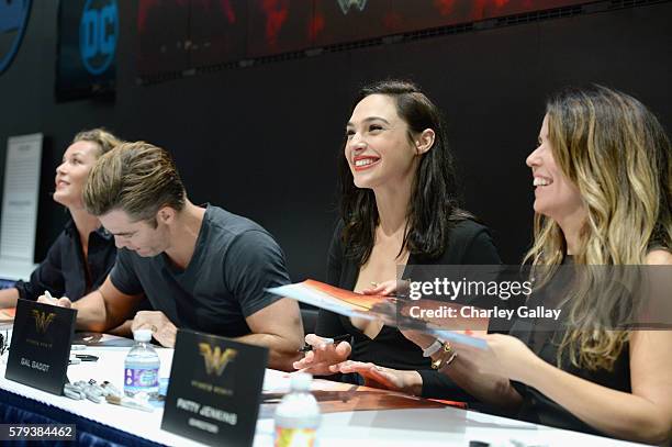 Actors Connie Nielsen, Chris Pine, Gal Gadot and director Patty Jenkins from the 2017 feature film Wonder Woman sign autographs for fans in DC's 2016...