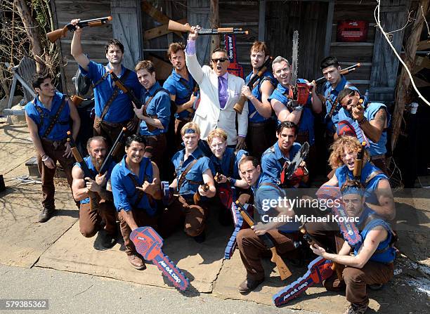 Actor Ray Santiago poses with guests at the "Ash vs Evil Dead" autograph signing during Comic-Con International 2016 at PETCO Park on July 23, 2016...