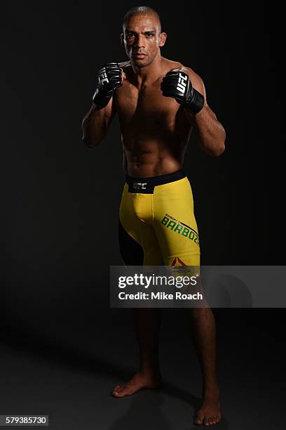 Edson Barboza of Brazil poses for a post fight portrait backstage during the UFC Fight Night event at the United Center on July 23, 2016 in Chicago,...
