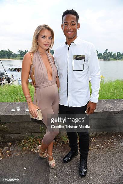 Dennis Aogo and his wife Ina Aogo attend the Airfield loves fashion cocktail on July 23, 2016 in Duesseldorf, Germany.