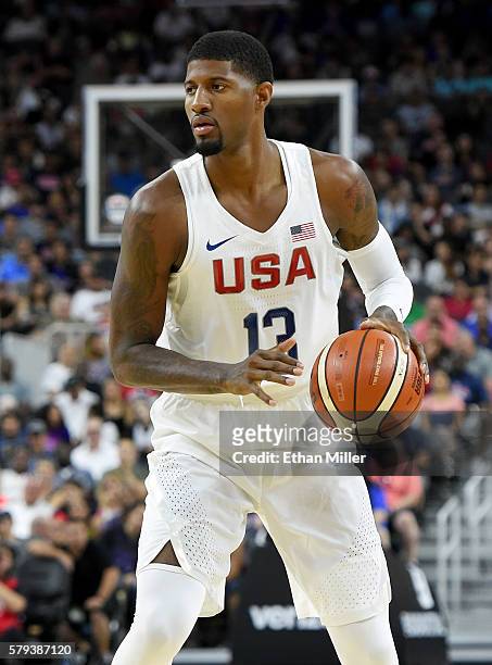Paul George of the United States brings the ball up the court against Argentina during a USA Basketball showcase exhibition game at T-Mobile Arena on...