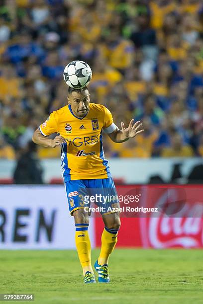 Juninho of Tigres heads the ball during the 2nd round match between Tigres UANL and Atlas as part of the Torneo Apertura 2016 Liga MX at...