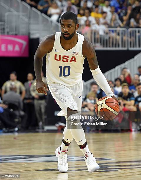 Kyrie Irving of the United States brings the ball up the court against Argentina during a USA Basketball showcase exhibition game at T-Mobile Arena...