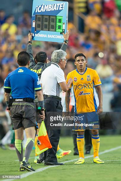 Ricardo 'Tuca' Ferretti, coach of Tigres gives instructions to Javier Aquino during the 2nd round match between Tigres UANL and Atlas as part of the...