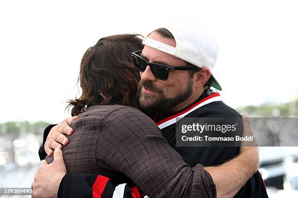 Actor Norman Reedus and host Kevin Smith attend the IMDb Yacht at San Diego Comic-Con 2016: Day Three at The IMDb Yacht on July 23, 2016 in San...