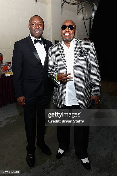 Attorney Benjamin Crump and comedian Earthquake pose backstage during the 2016 Neighborhood Awards hosted by Steve Harvey at the Mandalay Bay Events...