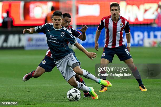 Jose Vazquez of Chivas fights for the ball with Arturo Gonzalez of Monterrey during the 2nd round match between Chivas and Monterrey as part of the...