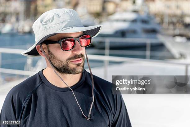 fashionable sailor on yacht - sunglasses reflection stock pictures, royalty-free photos & images