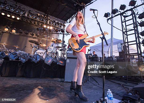 Este Haim of Haim performs during the Mo Pop Festival at West Riverfront Park on July 23, 2016 in Detroit, Michigan.