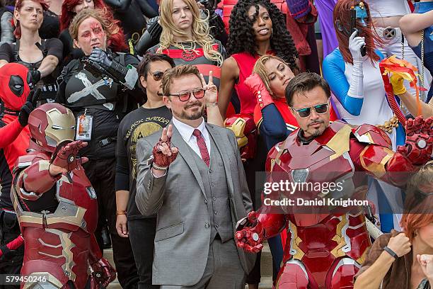 Costumed fans dressed as characters from the Marvel Universe attend a group photo session at Comic-Con International - Day 3 on July 22, 2016 in San...