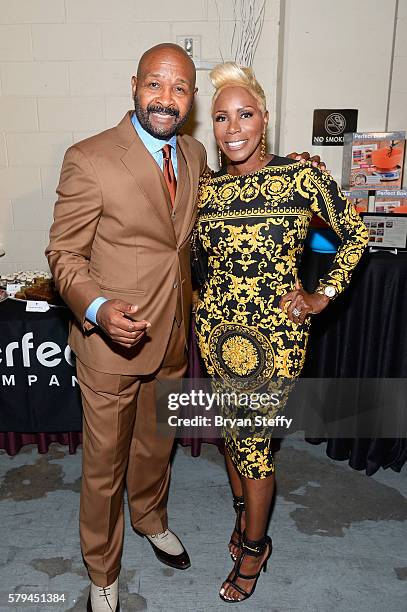 Neighborhood Awards Executive Producer Rushion McDonald and comedian Sommore pose backstage during the 2016 Neighborhood Awards hosted by Steve...