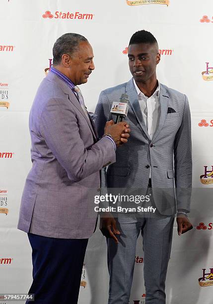 Television personality Ed Gordon interviews Nehemiah Davis, the recipient of the "Good Neighbor Award" during the 2016 Neighborhood Awards hosted by...