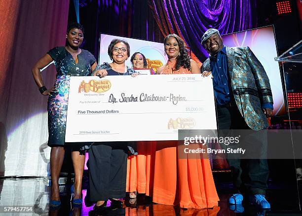 Radio Personality Carla Ferrell , winner of "Best School Teacher" Dr. Shandra Claiborne-Payton and actor/comedian Lavell Crawford pose with the award...