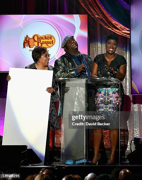 Actor/comedian Lavell Crawford and radio personality Carla Ferrell present the "Best Teacher Award" during the 2016 Neighborhood Awards hosted by...