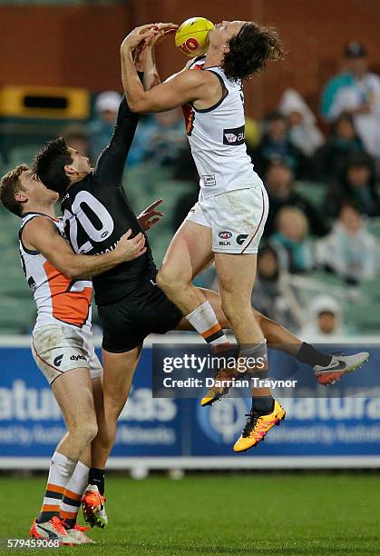 Phil Davis of the Giants attempts to mark the ball during the round 18 AFL match between the Port Adelaide Power and the Greater Western Sydney...