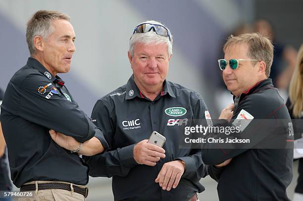 Martin Whitmarsh, Sir Keith Mills, and Sir Charles Dunstone, are seen ahead of The Duke and Duchess of Cambridge's visit to the Land Rover BAR at the...