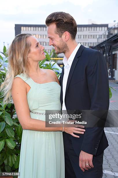 Anna Hofbauer and boyfriend Marvin Albrecht attend the Unique show during Platform Fashion July 2016 at Areal Boehler on July 23, 2016 in...