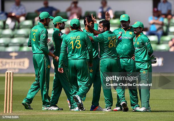 Bilawal Bhatti of Pakistan celebrates with team mates after taking the wicket of Daniel Bell-Drummond of England during the Triangular Series match...