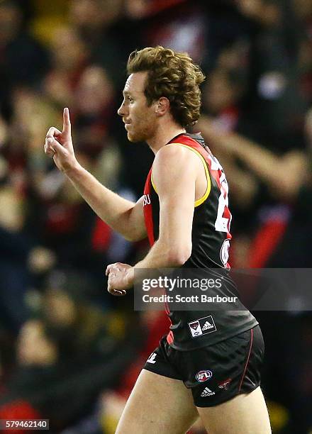 Mitch Brown of the Bombers celebrates after kicking a goal during the round 18 AFL match between the Essendon Bombers and the Brisbane Lions at...